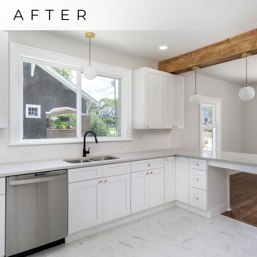 Remodeled white shaker kitchen with a wood ceiling beam and pendant lights